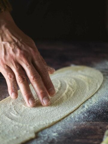 spread flour all over the pasta dough.