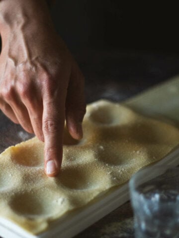 rub the edges of the wholes with water