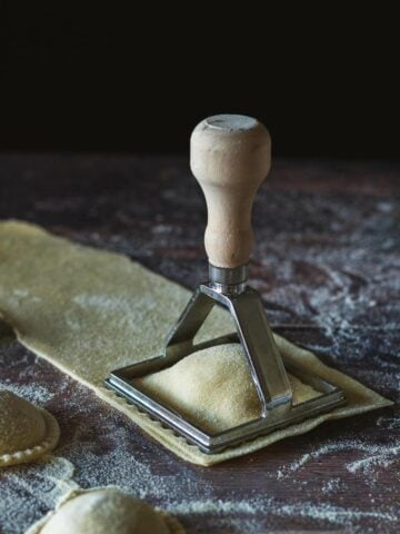 press ravioli cutter firmly