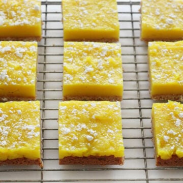 gluten free vegan lemon bars on a baking rack