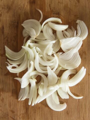 cut onions into half moons