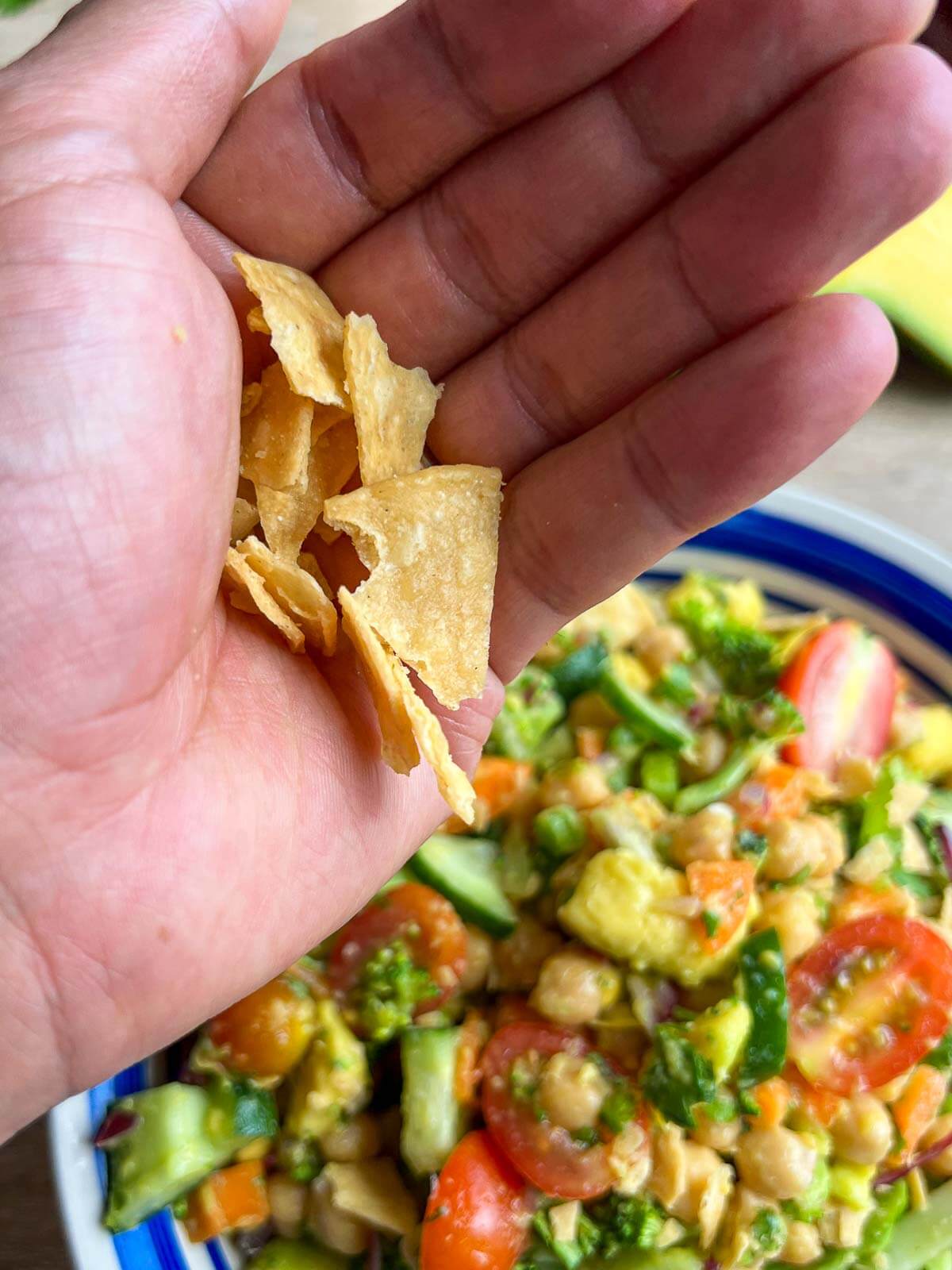 add vegan nacho chips on the chickpea salad