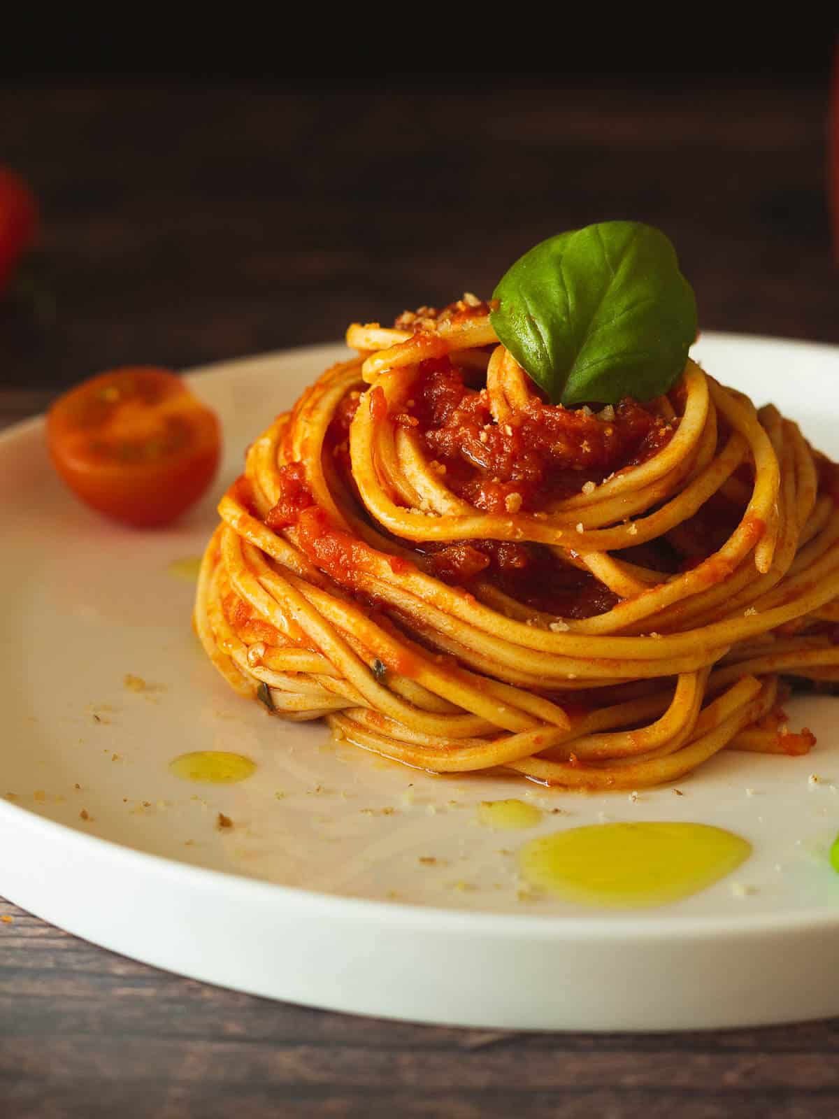 Vegan spaghetti with simple tomato sauce and basil