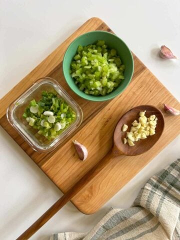 finely chopped green onions, garlic, and celery.