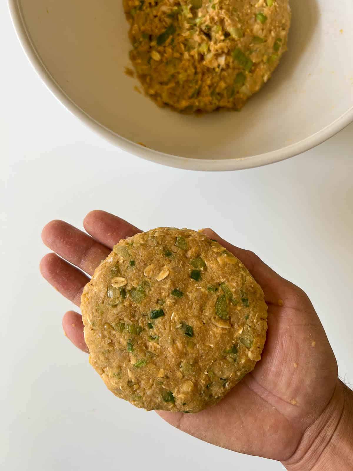 make chickpea patties with your hands, starting with balls and them pressing them with the palm of your hands