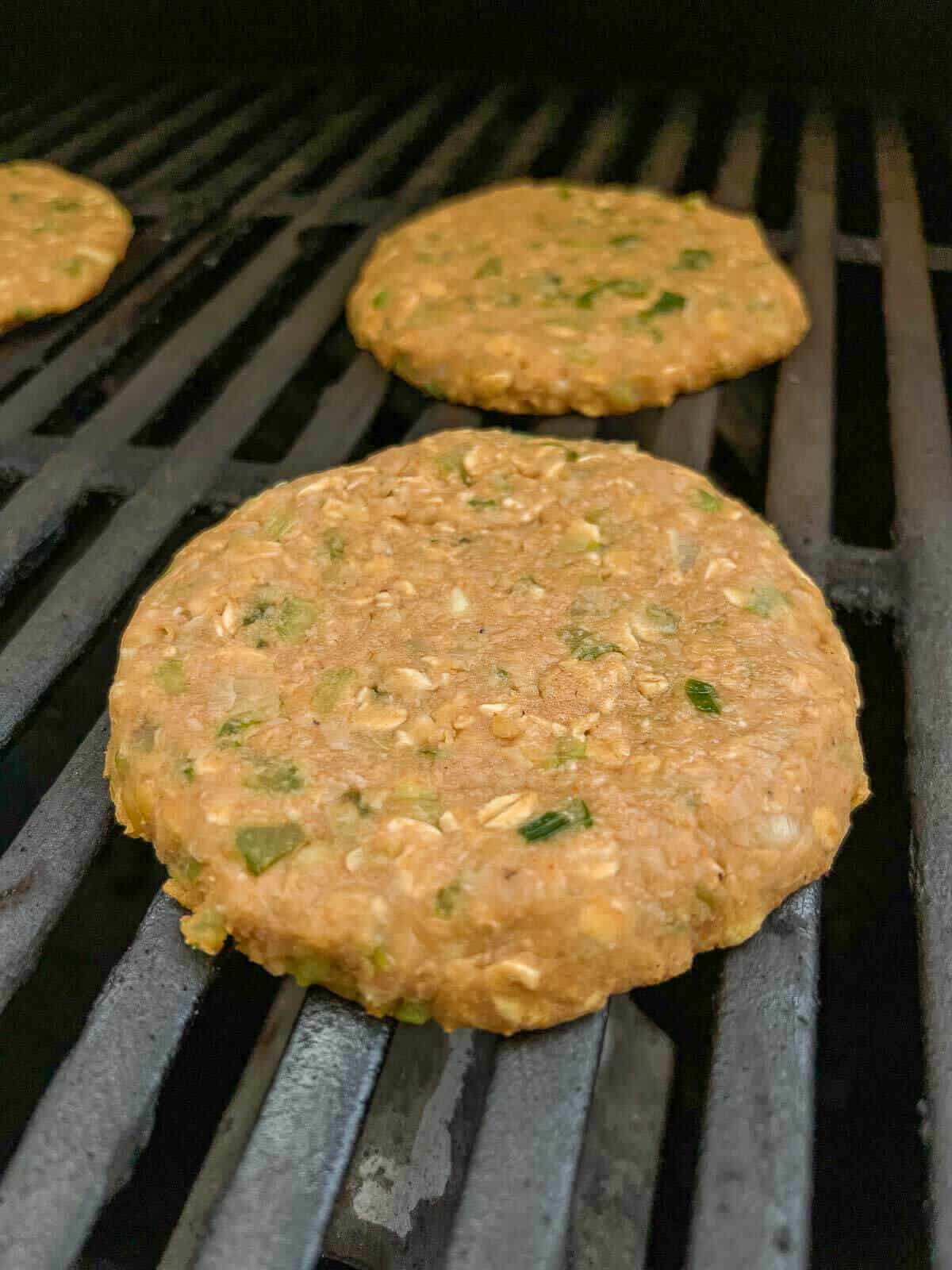 chickpea burgers on a grill.