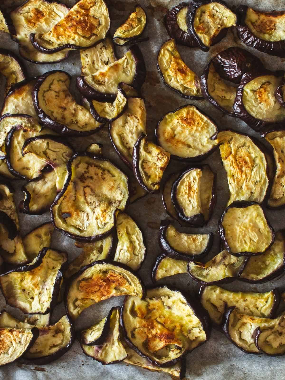 sliced eggplants grilled in the oven of parchment paper.