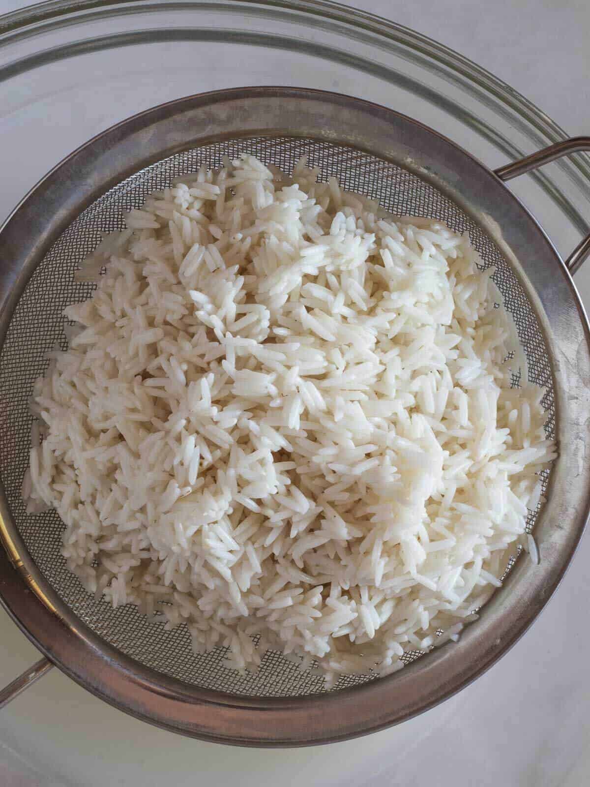 drain the rice to remove the excess starch