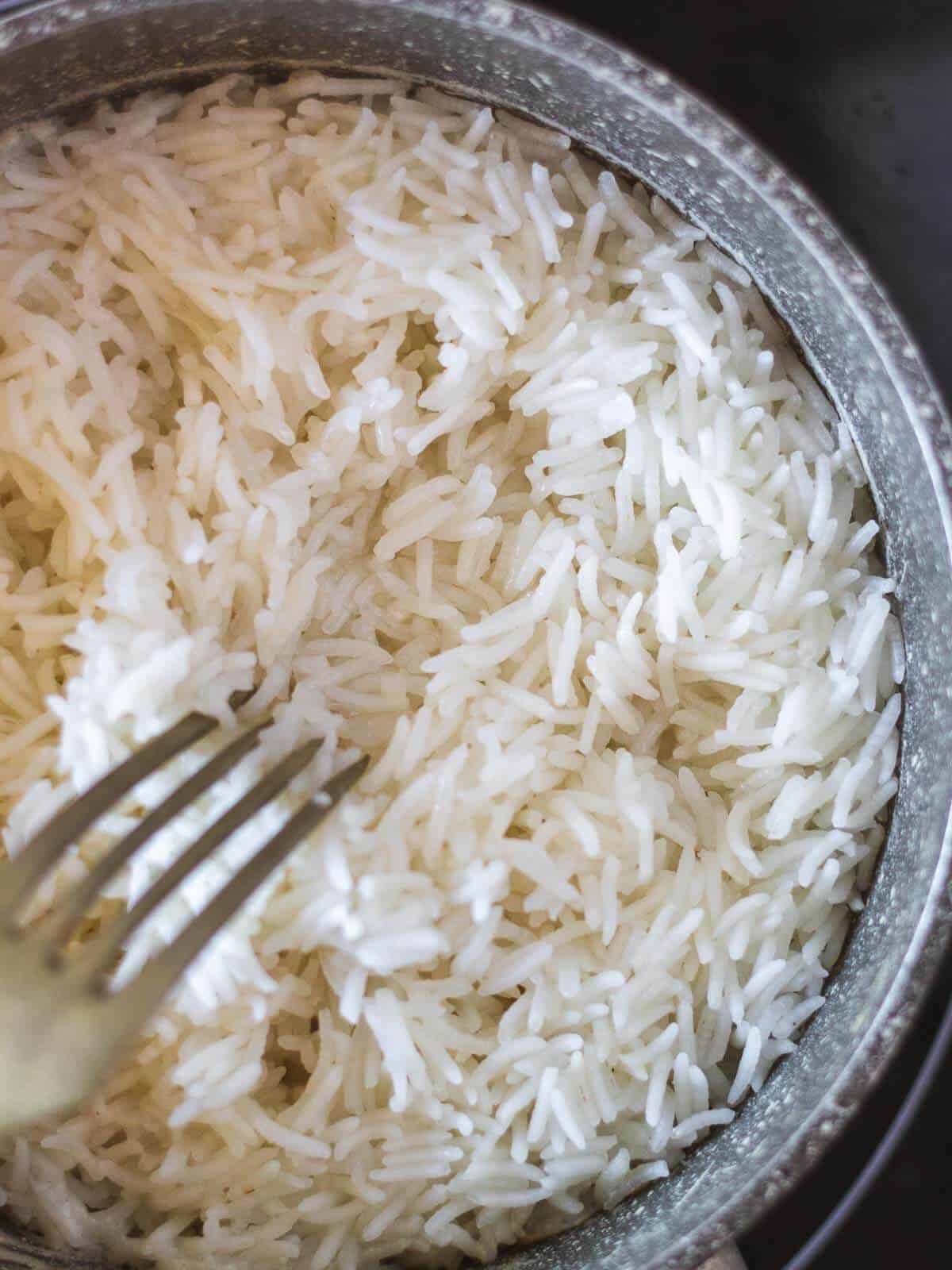 move the fluffy rice with a fork