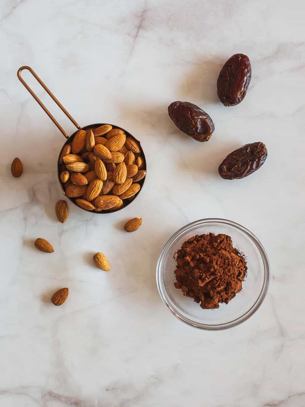 vegan chocolate milk ingredients, almonds, dates and cocoa powder