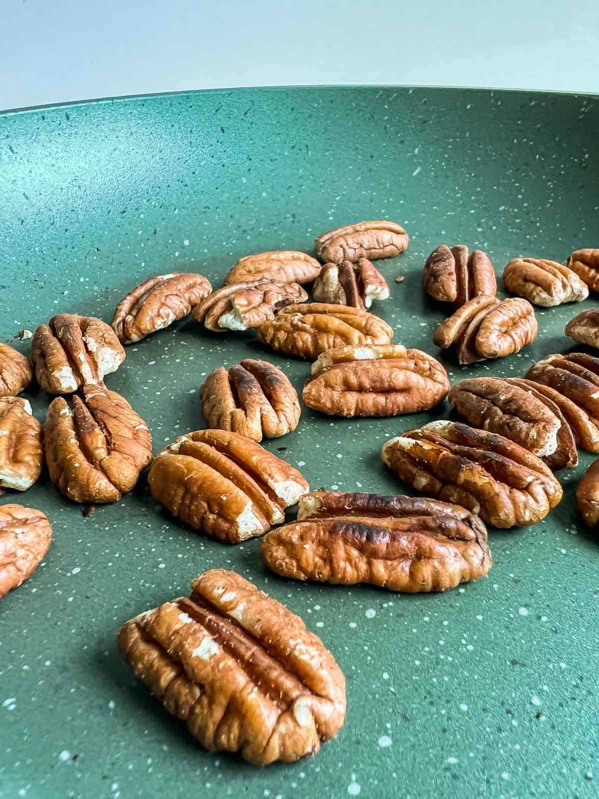 lightly toast pecan nuts