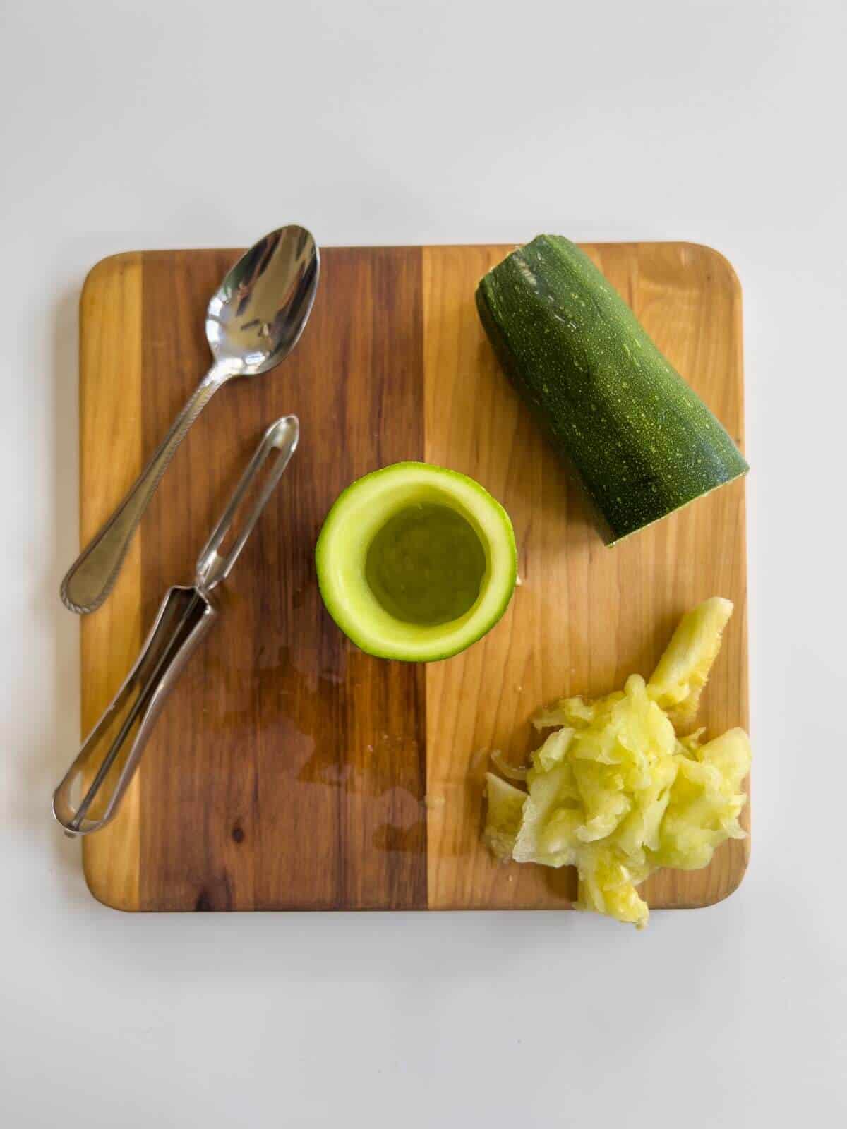 removing inner flesh of zucchini.