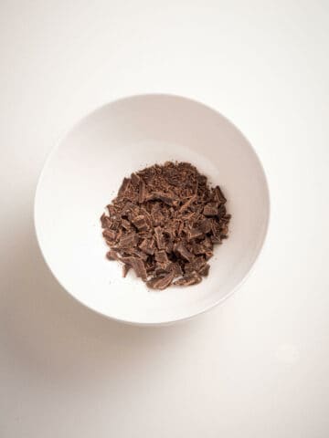 chopped vegan chocolate in a bowl.