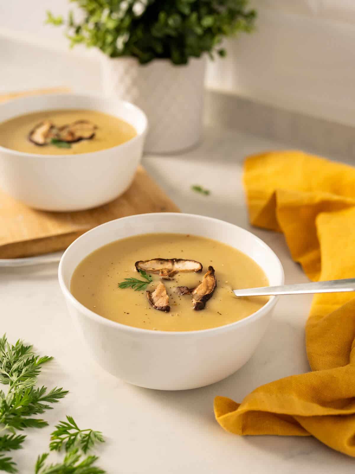 4-ingredient potato soup garnished with sautéd mushrooms.