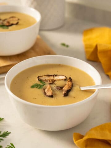 4-ingredient potato soup garnished with sautéd mushrooms featured.