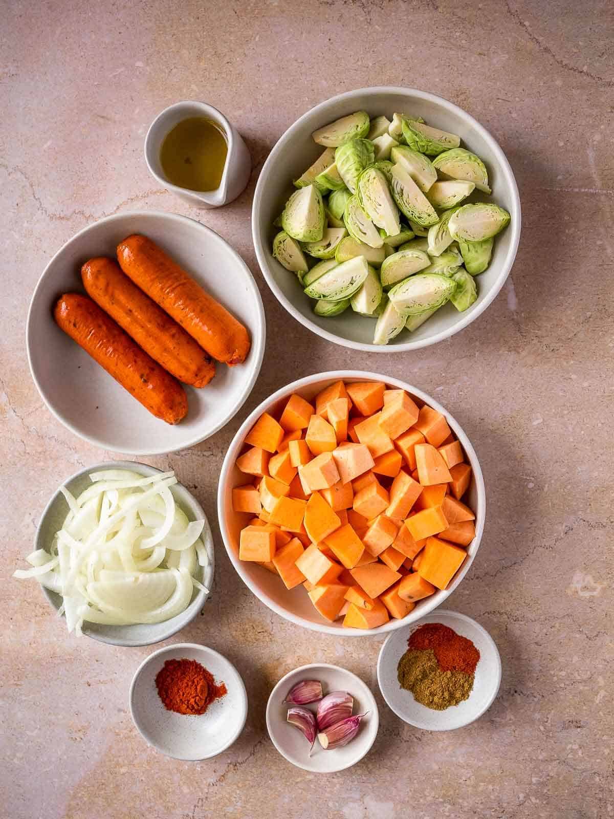 sweet potato breakfast hash with Brussels sprouts ingredients on a table.