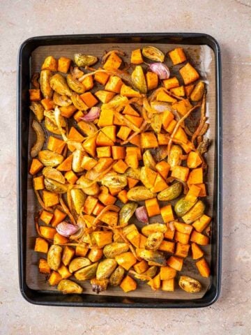 baking sheet with all the vegetables spread over.