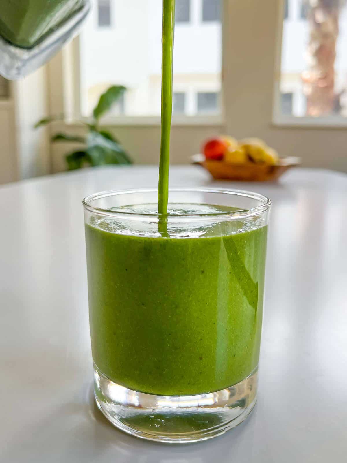 serving spinach green smoothie.