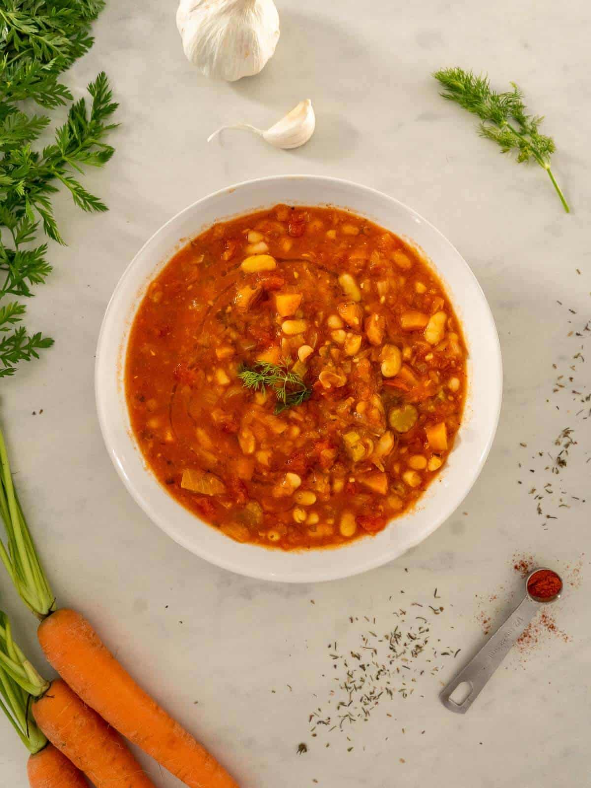 serve Greek fasolada soup with extra chili flakes.