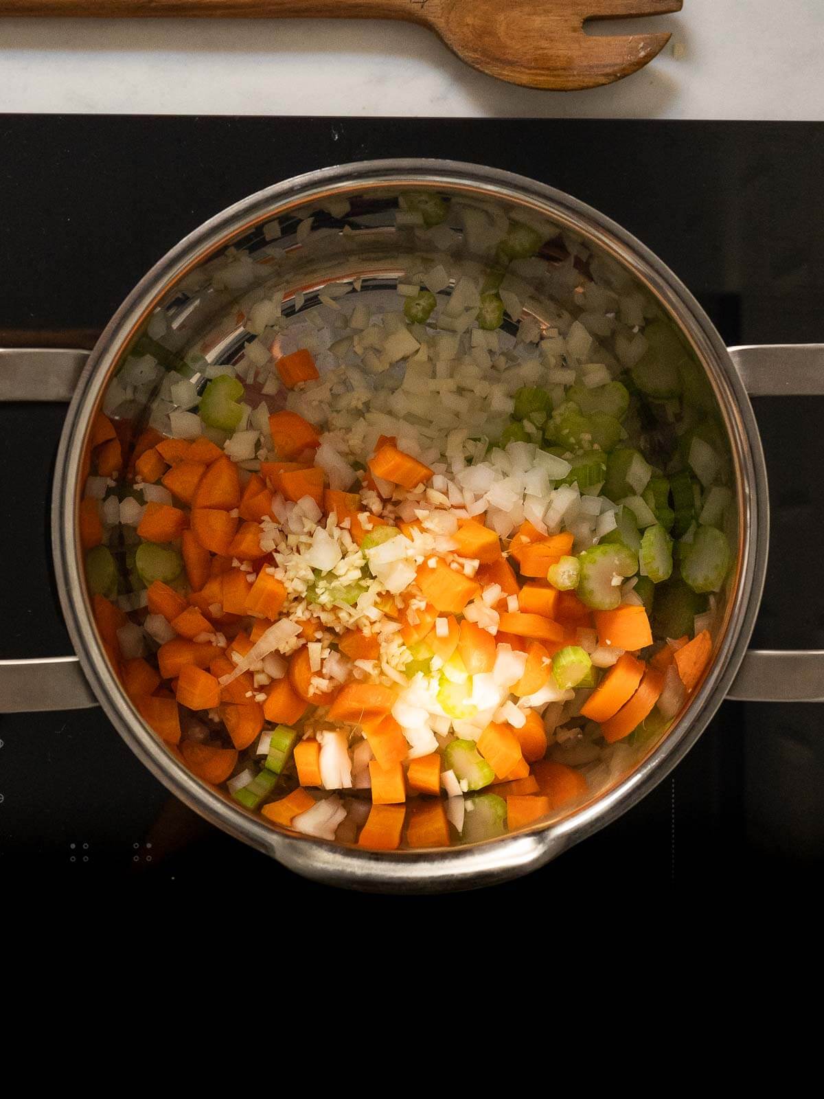 stir frying the ingredients.