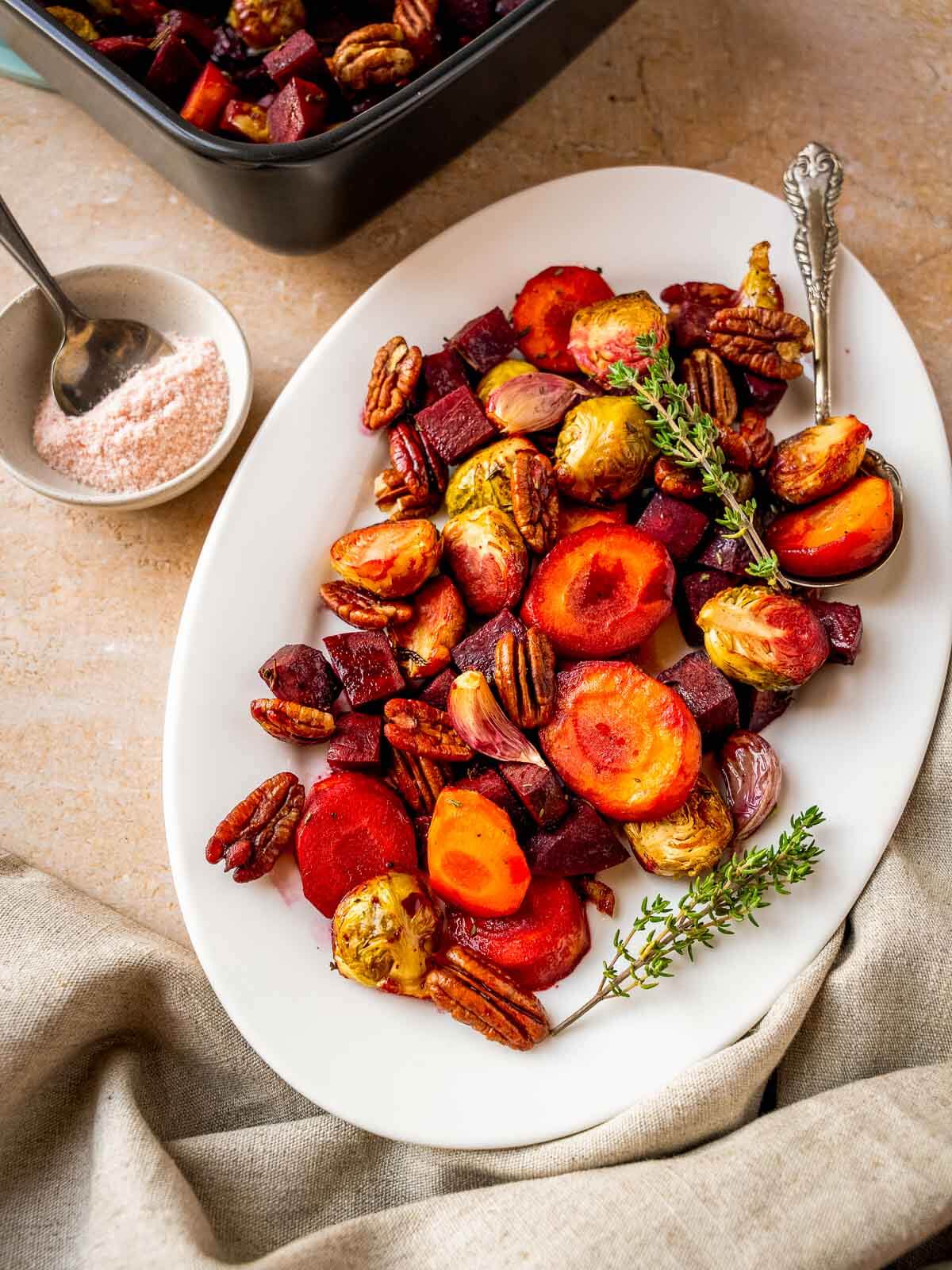 Honey Roasted Vegetables with Brussels Sprouts and Carrots served on a Holiday table.