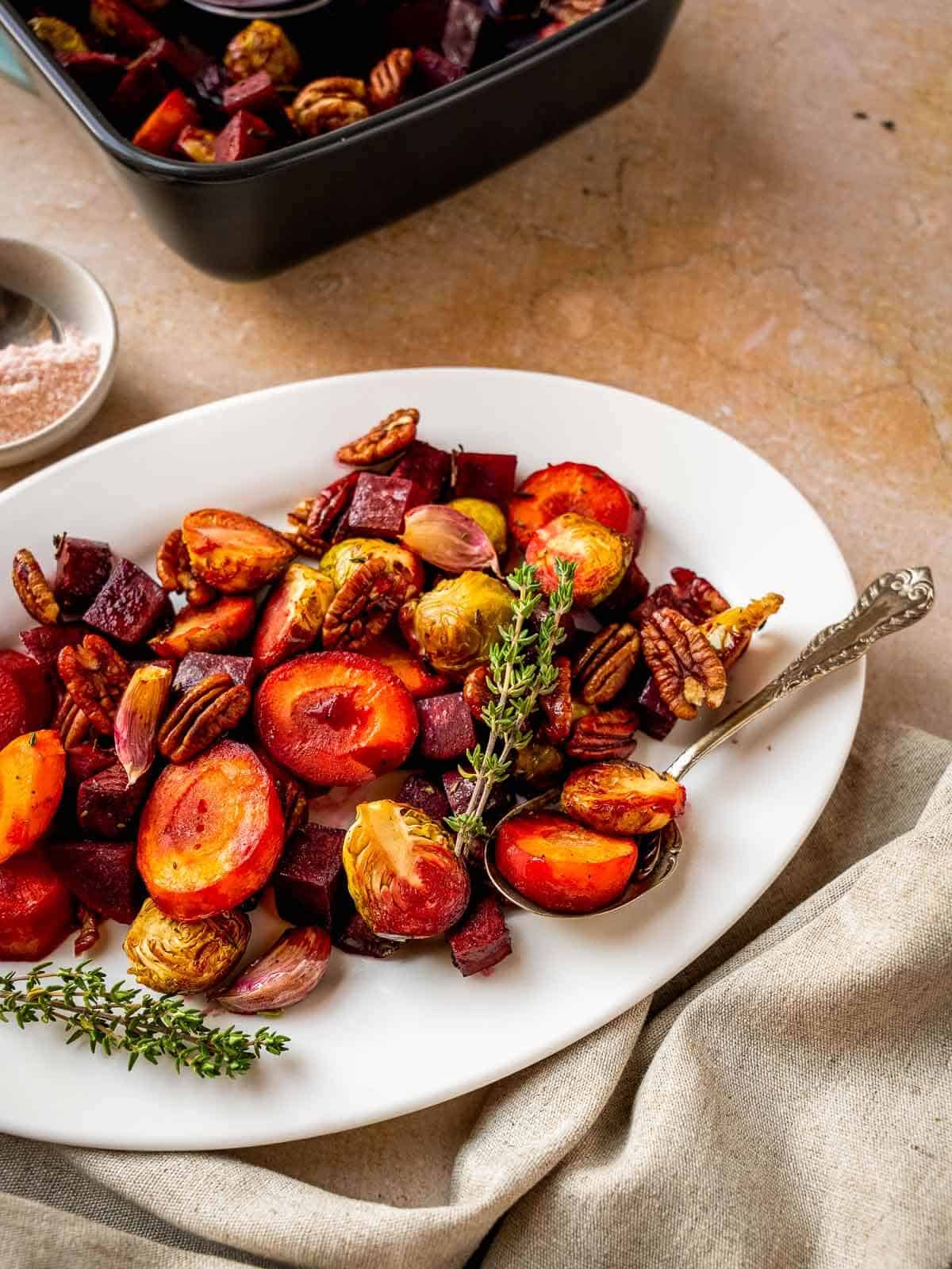 serving Mediterranean Honey Roasted Vegetables with Brussels Sprouts and Carrots.