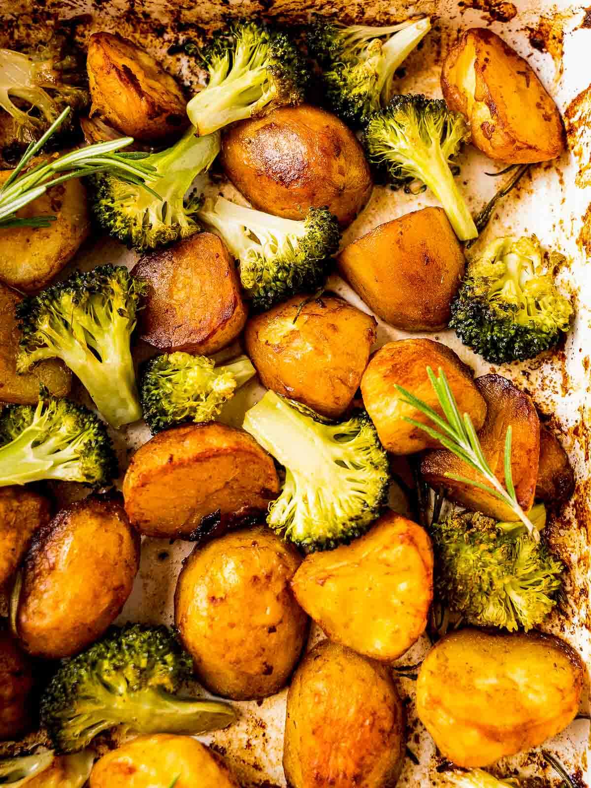 roasted garlic and rosemary potatoes with marmite close up.