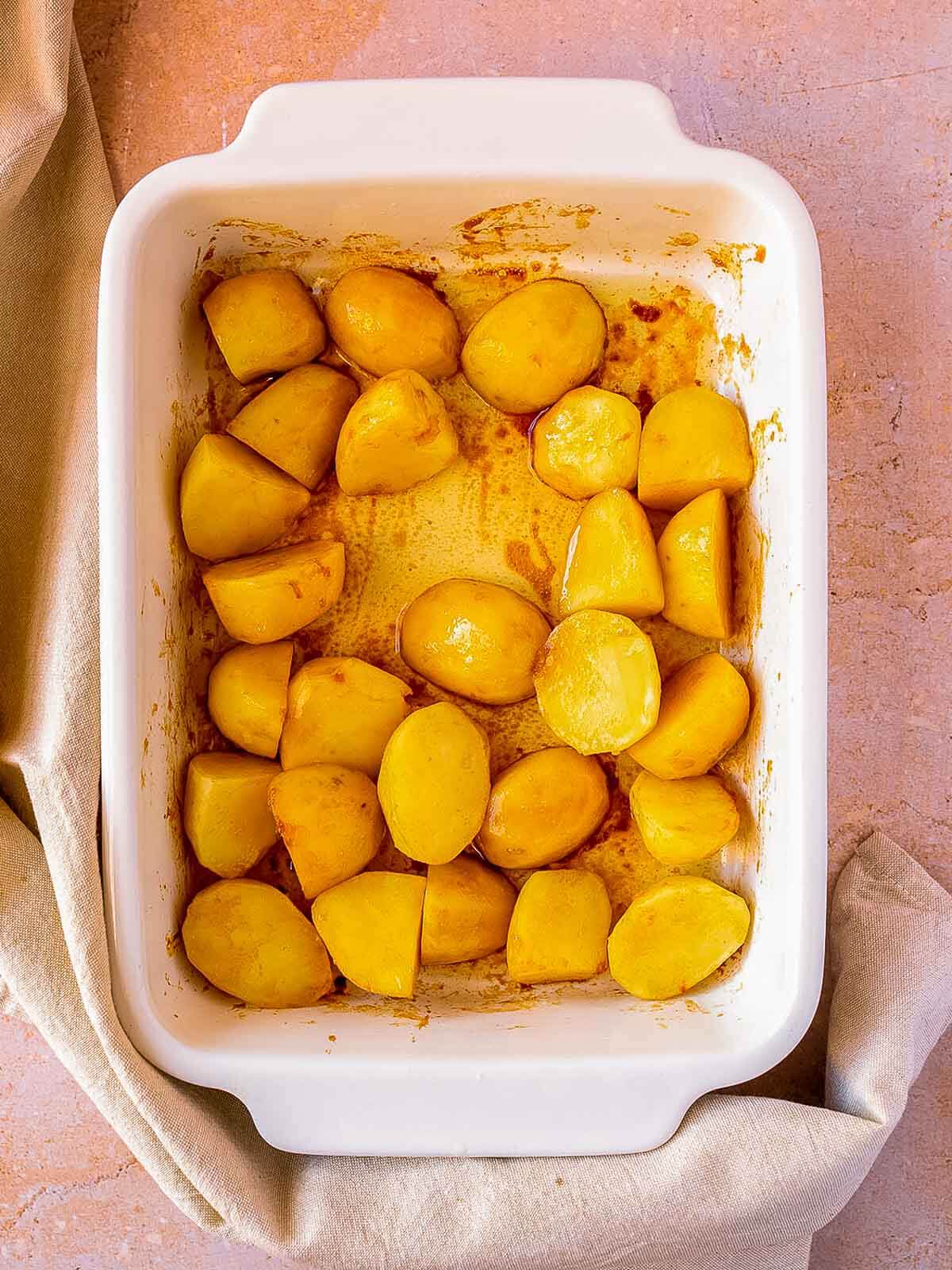 coat the potatoes with olive oil and marmite mixture.