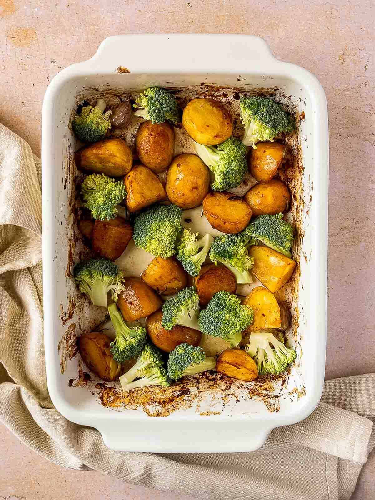 add broccoli florets to the fried potatoes.