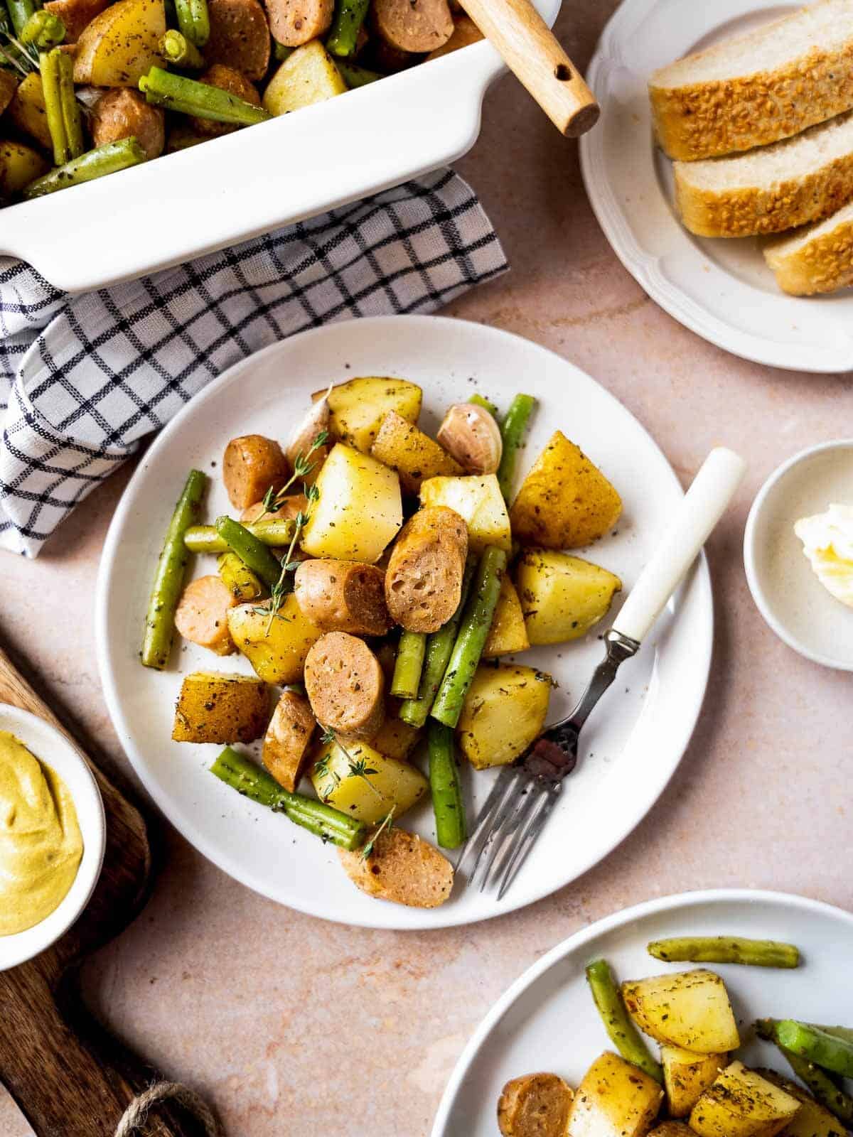 green beans potatoes and sausage plated.