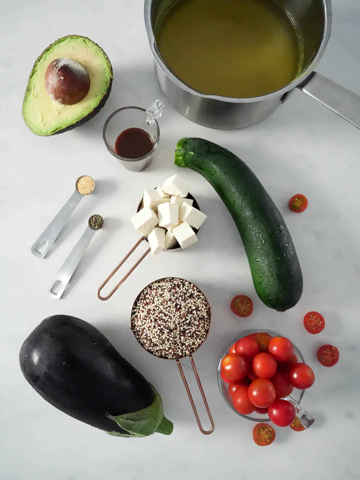 sauteed tofu buddha bowl with quinoa ingredients.