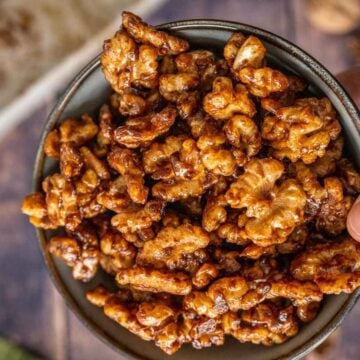 brown sugar candied walnuts in a bowl.