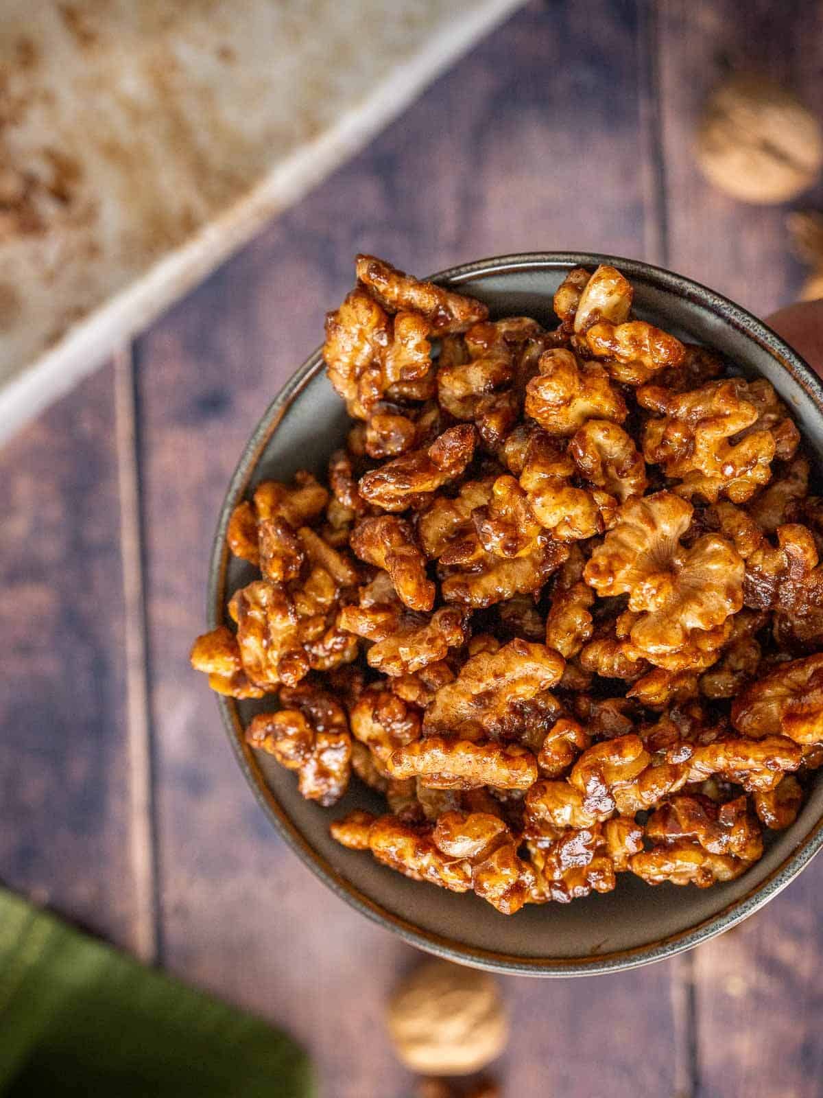 brown sugar candied walnuts in a bowl.