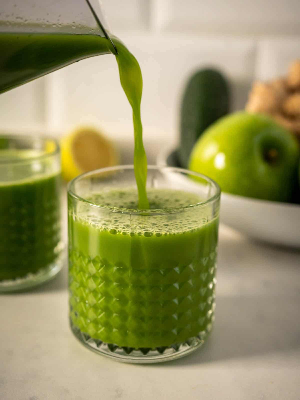 serving Spinach and Green Mean apple juice.