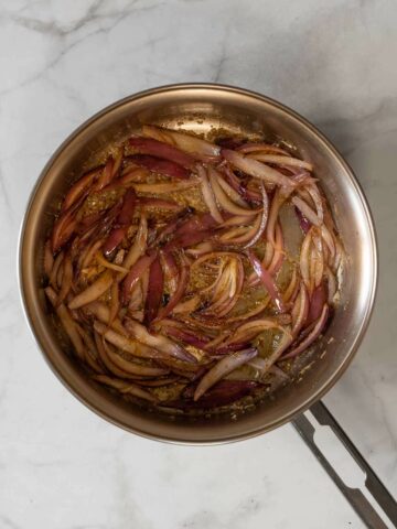 caramelize red onions until golden brown in a saucepan.