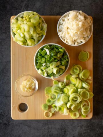 chopp vegetables for lentils stew.