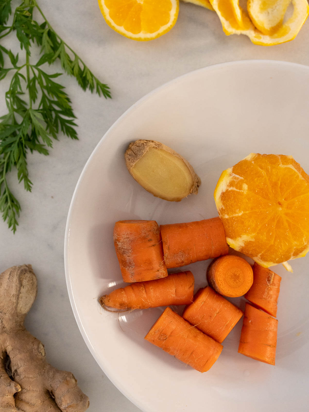 ingredients to make Orange Carrot Juice.