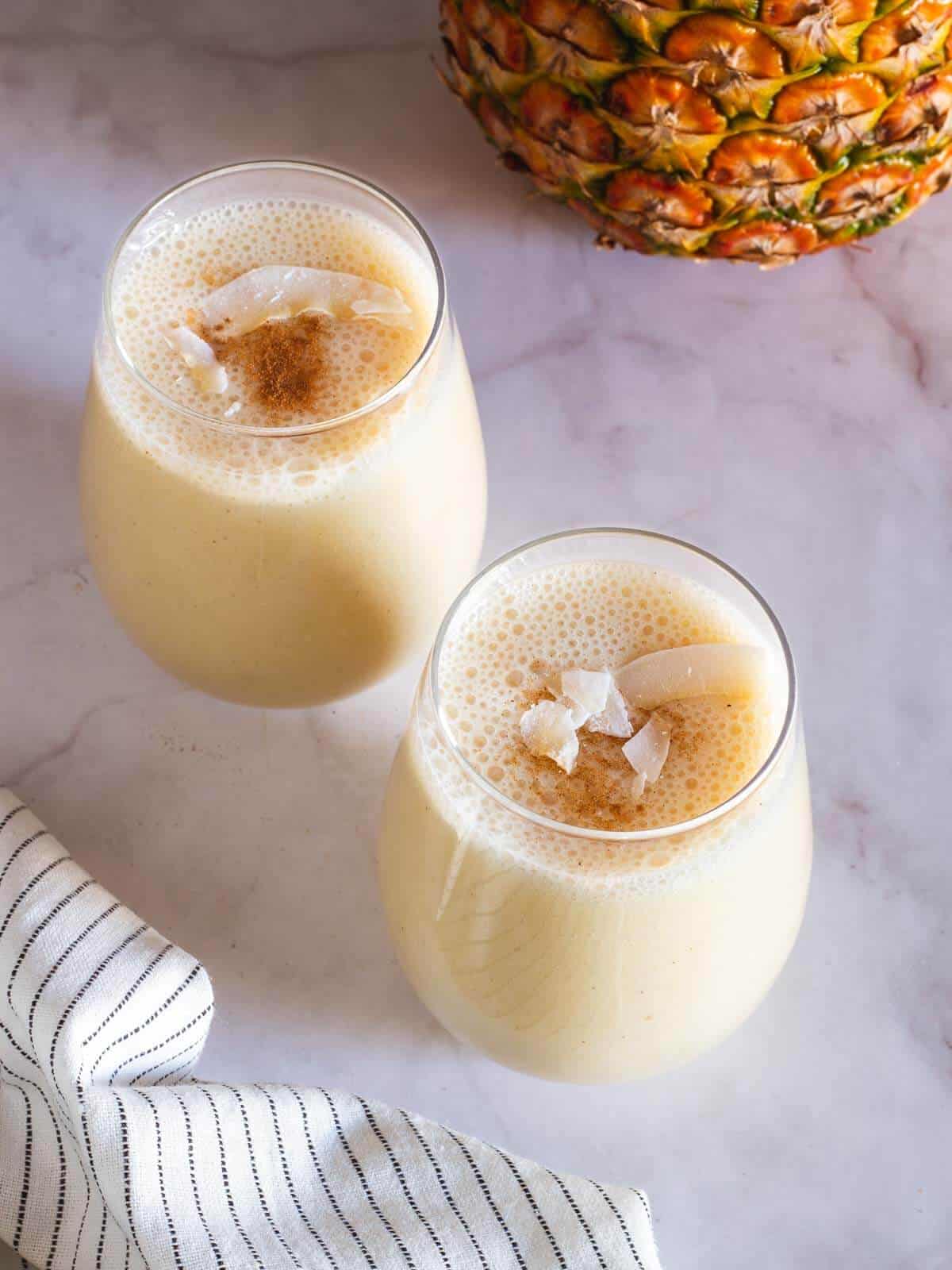 served horchata drink in two glasses.