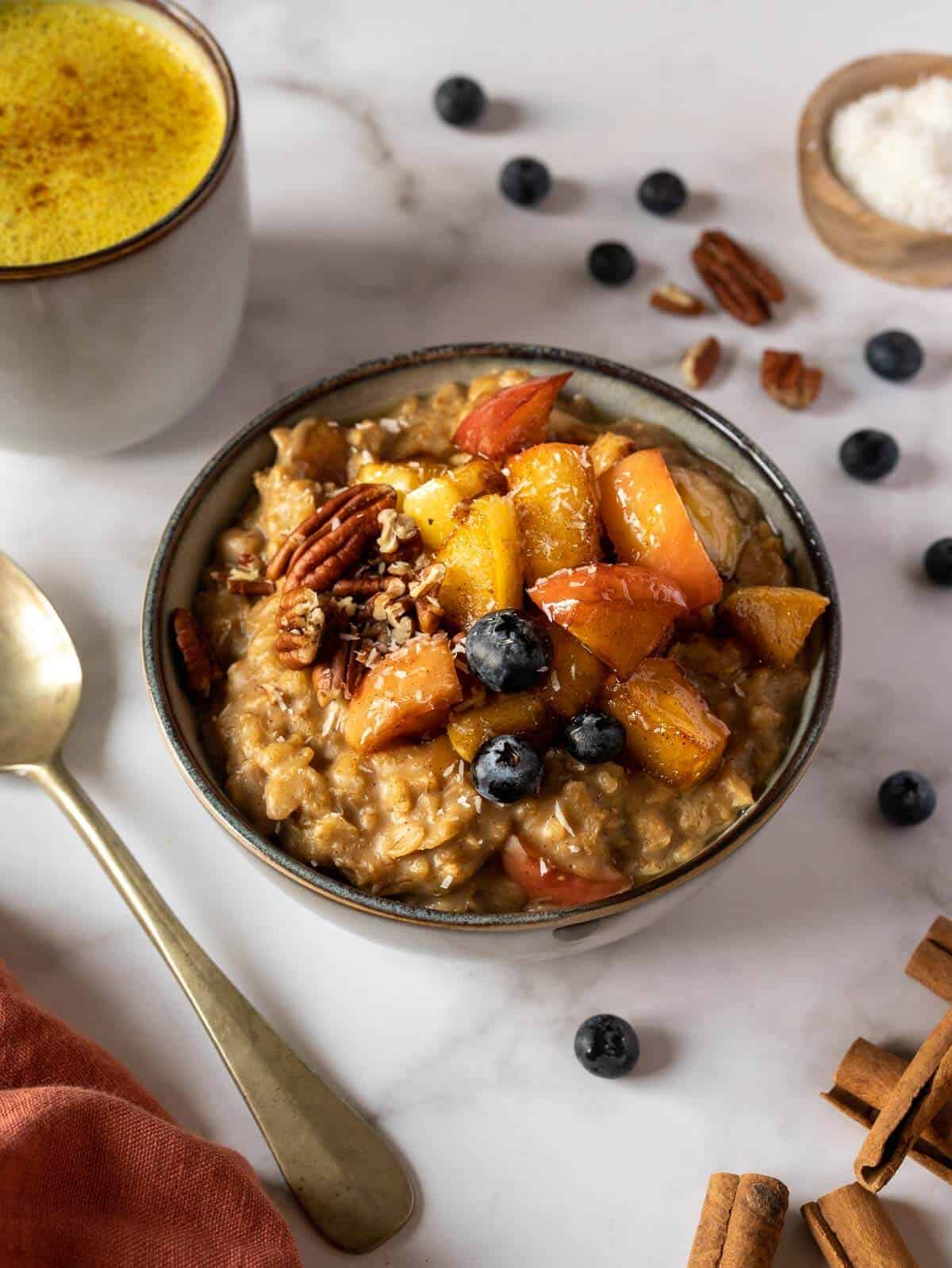 apple cinnamon oats served in a bowl.