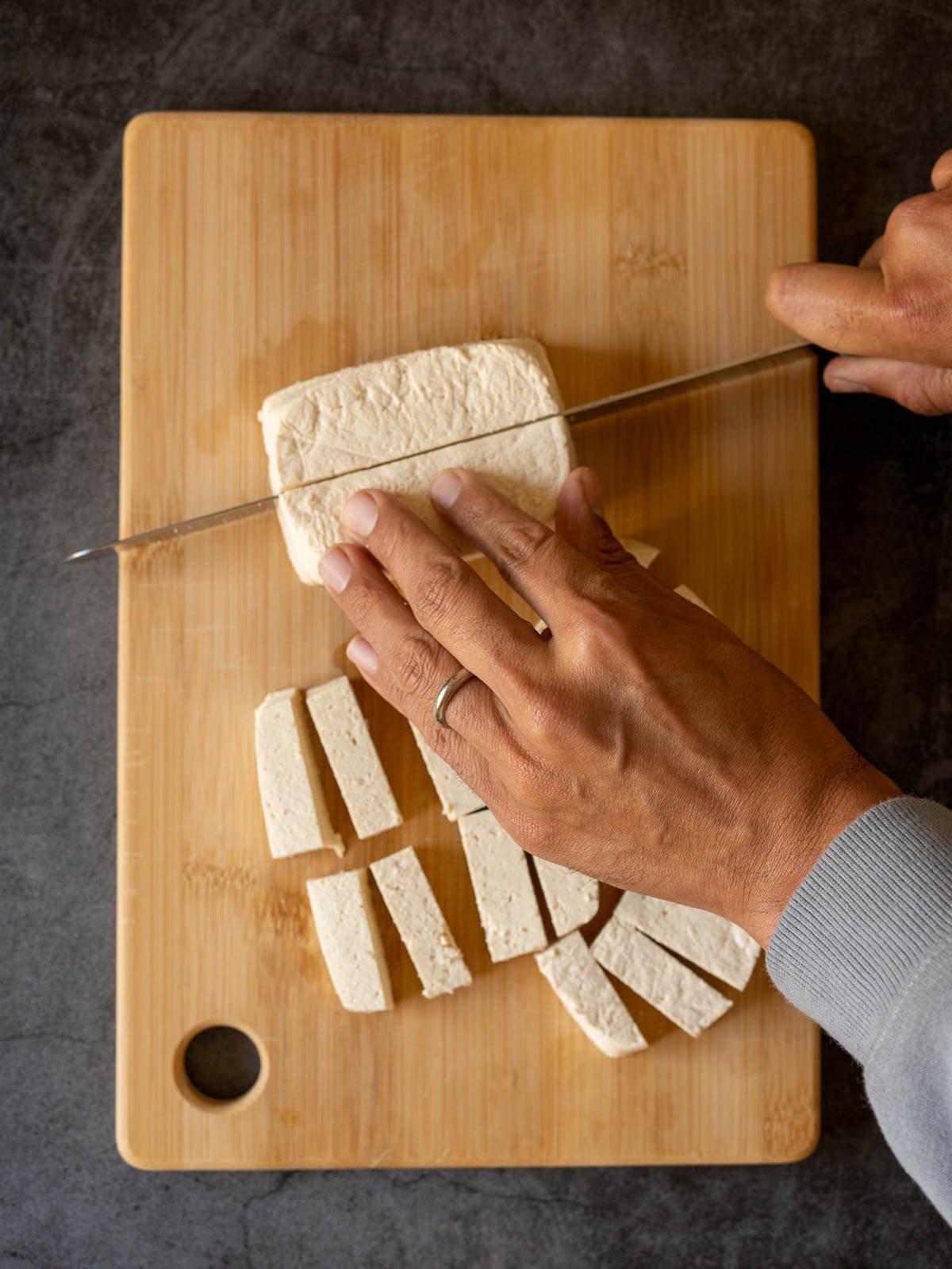 cutting tofu cubes.