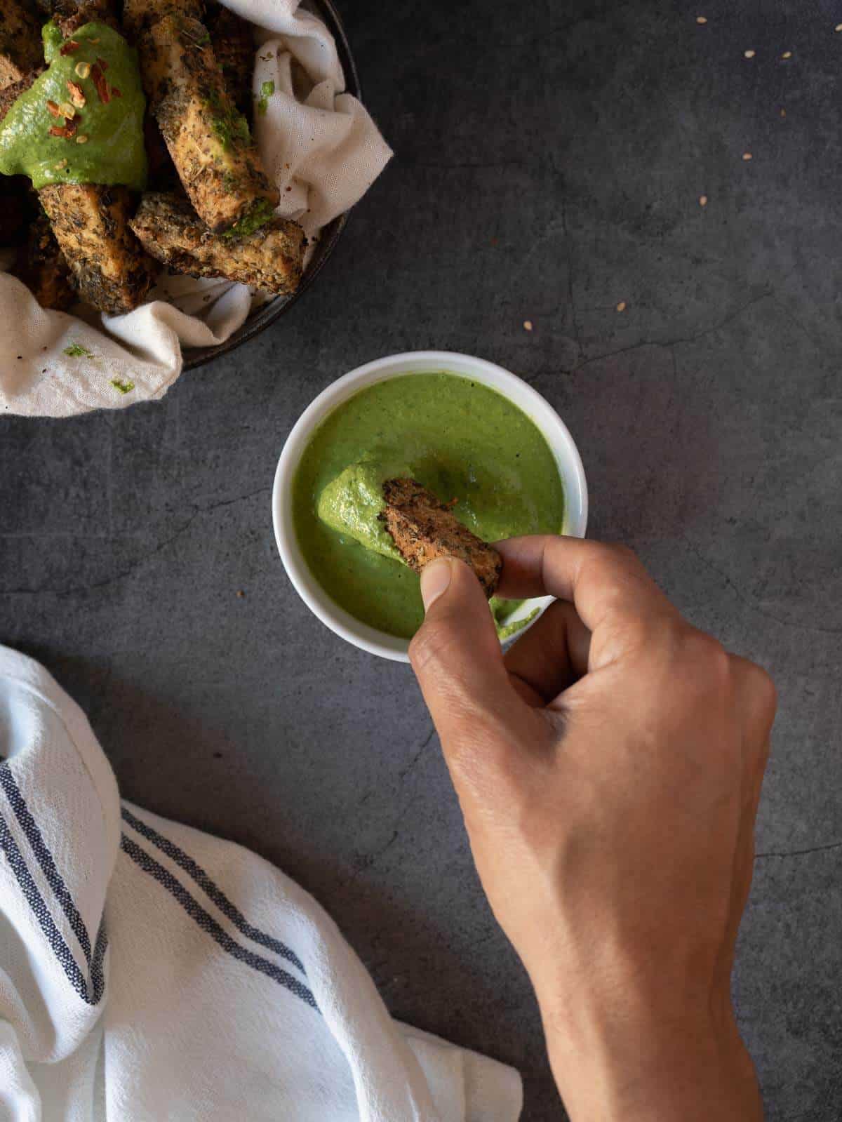 tofu nugget in dipping sauce.