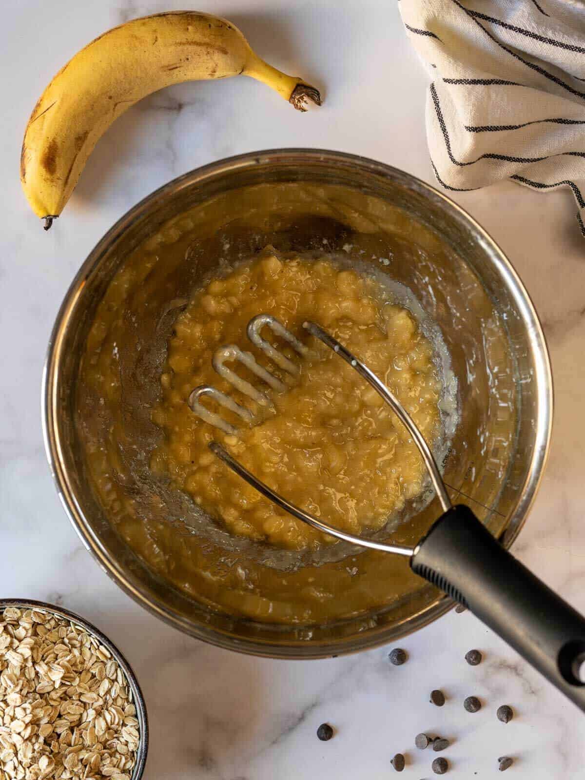 mash bananas until smooth.