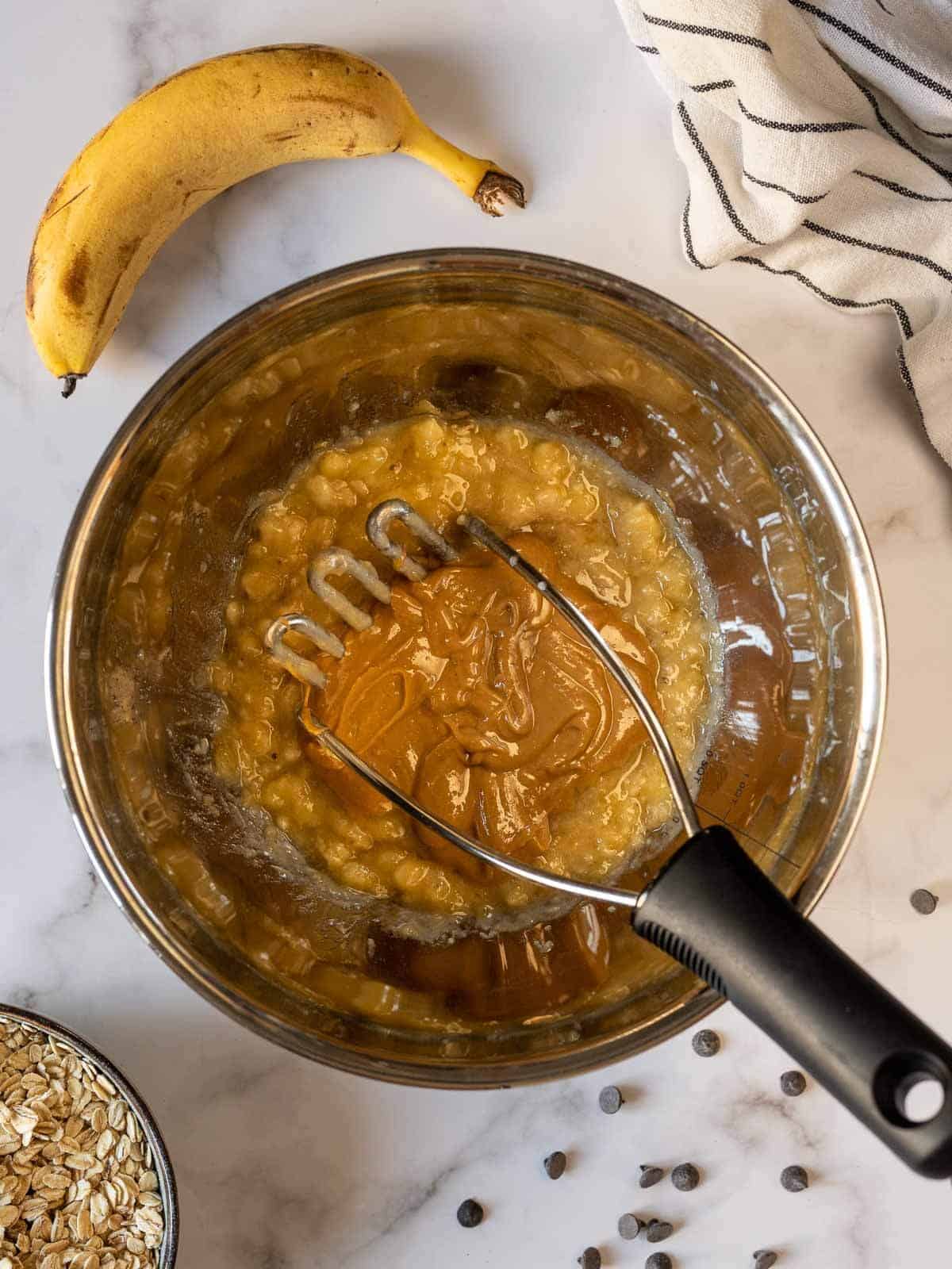 add peanut butter and mix well with the mashed bananas.