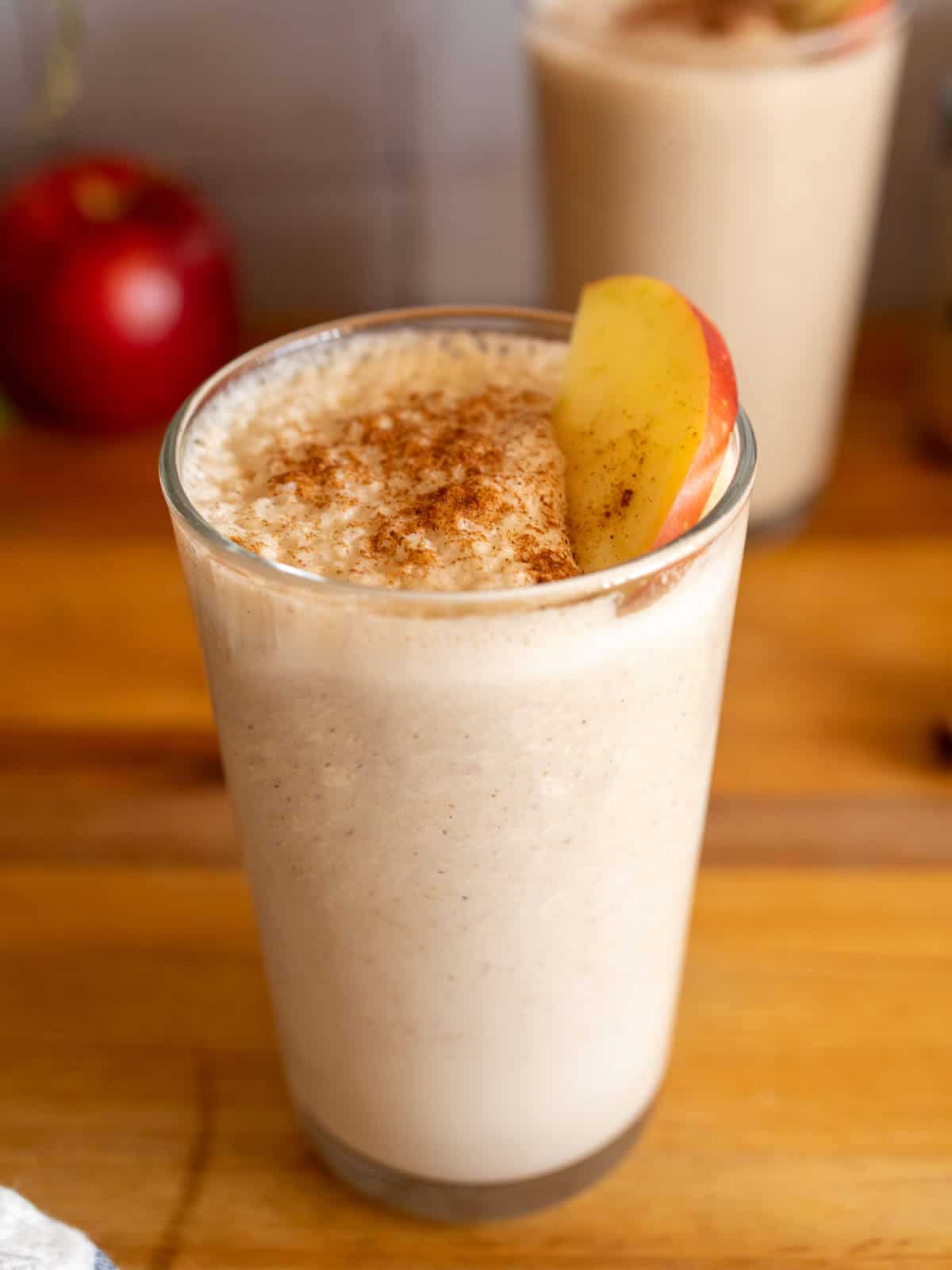 topping the apple cinnamon smoothie with extra ground cinnamon