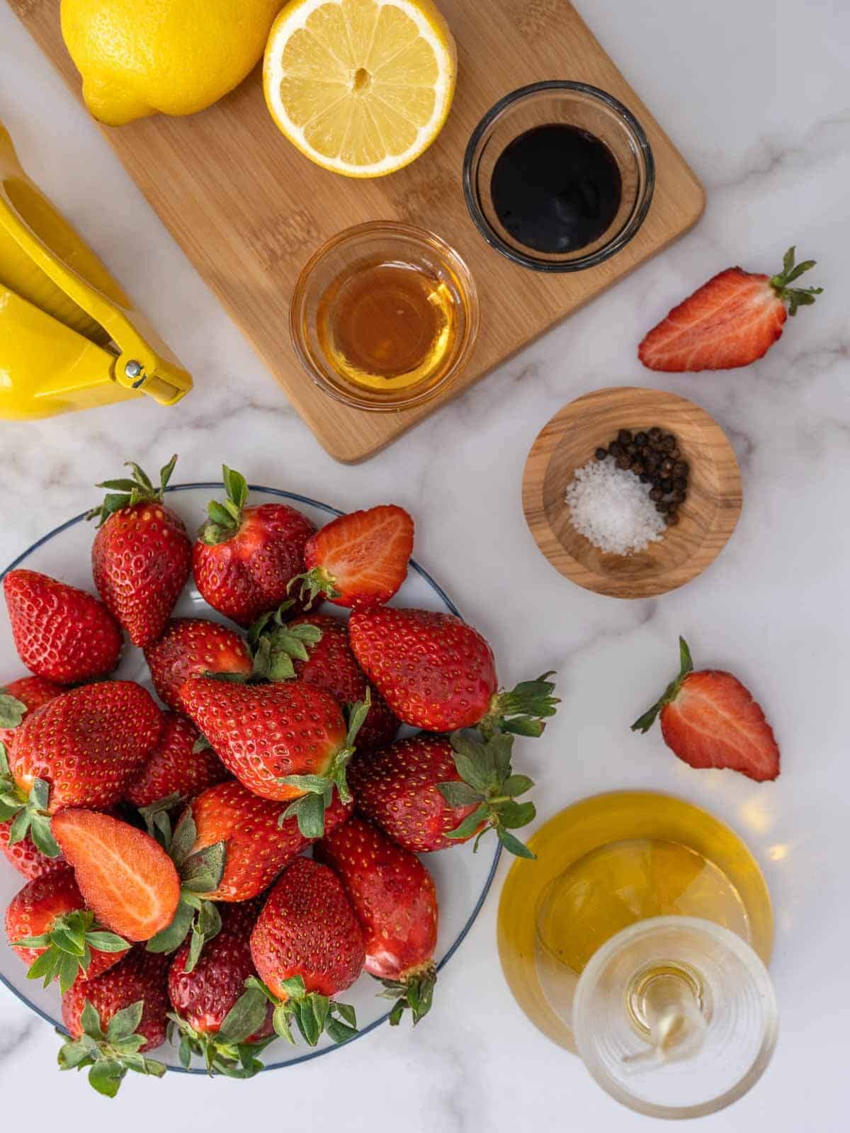 ingredients to make strawberry balsamic dressing.