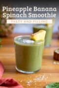 two pineapple banana spinach smoothies on a wooden table pin.