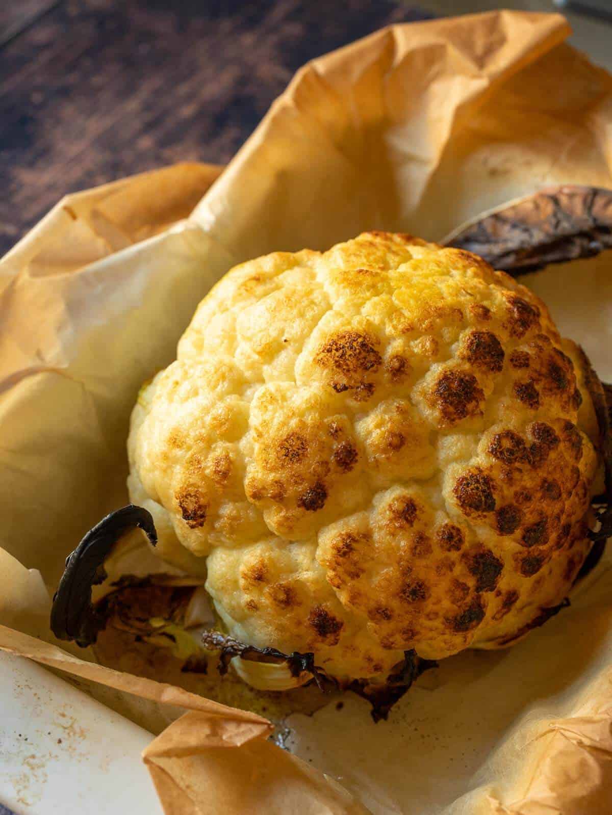 perfectly roasted whole cauliflower head.