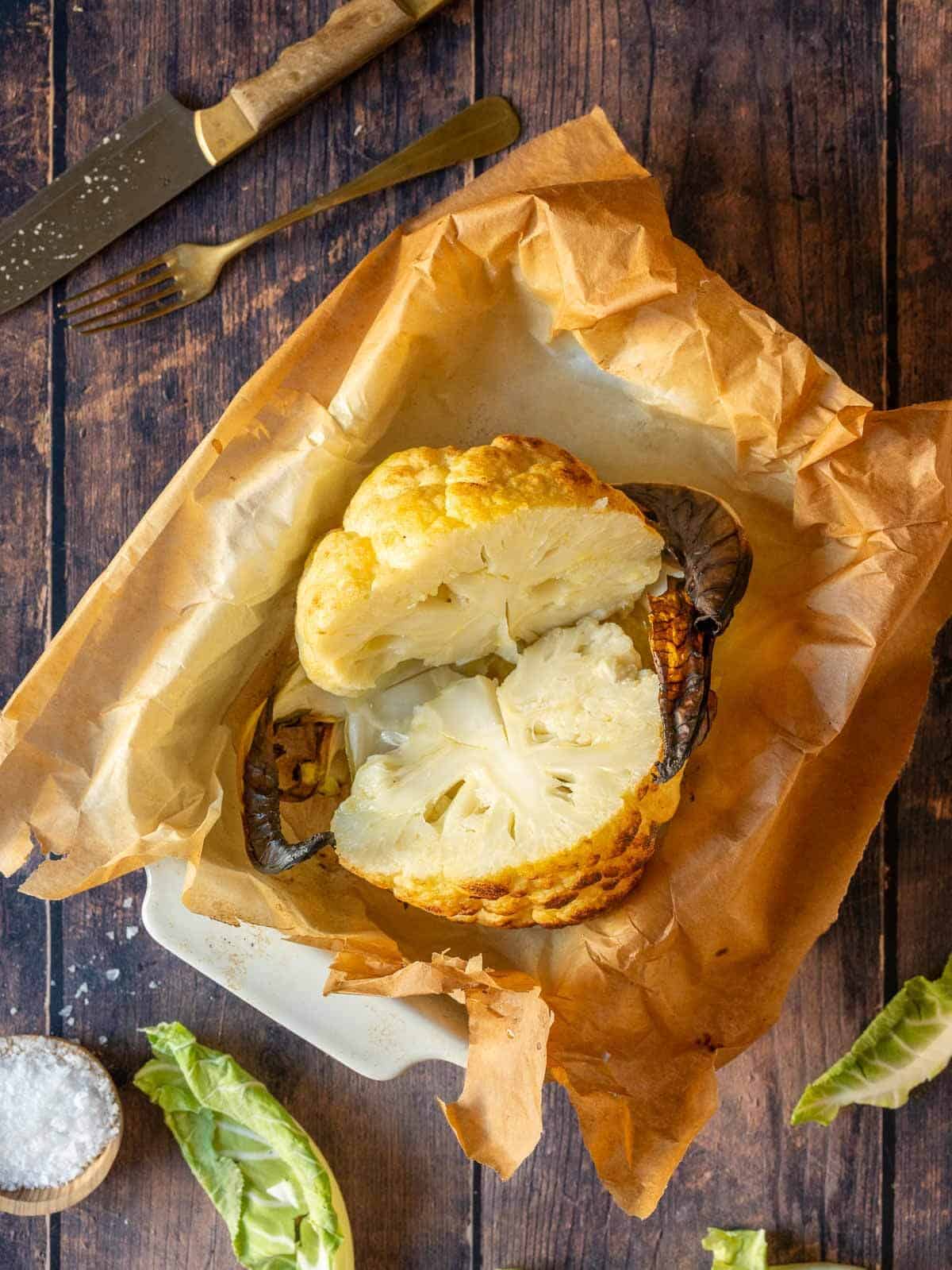 halved roasted whole cauliflower head.