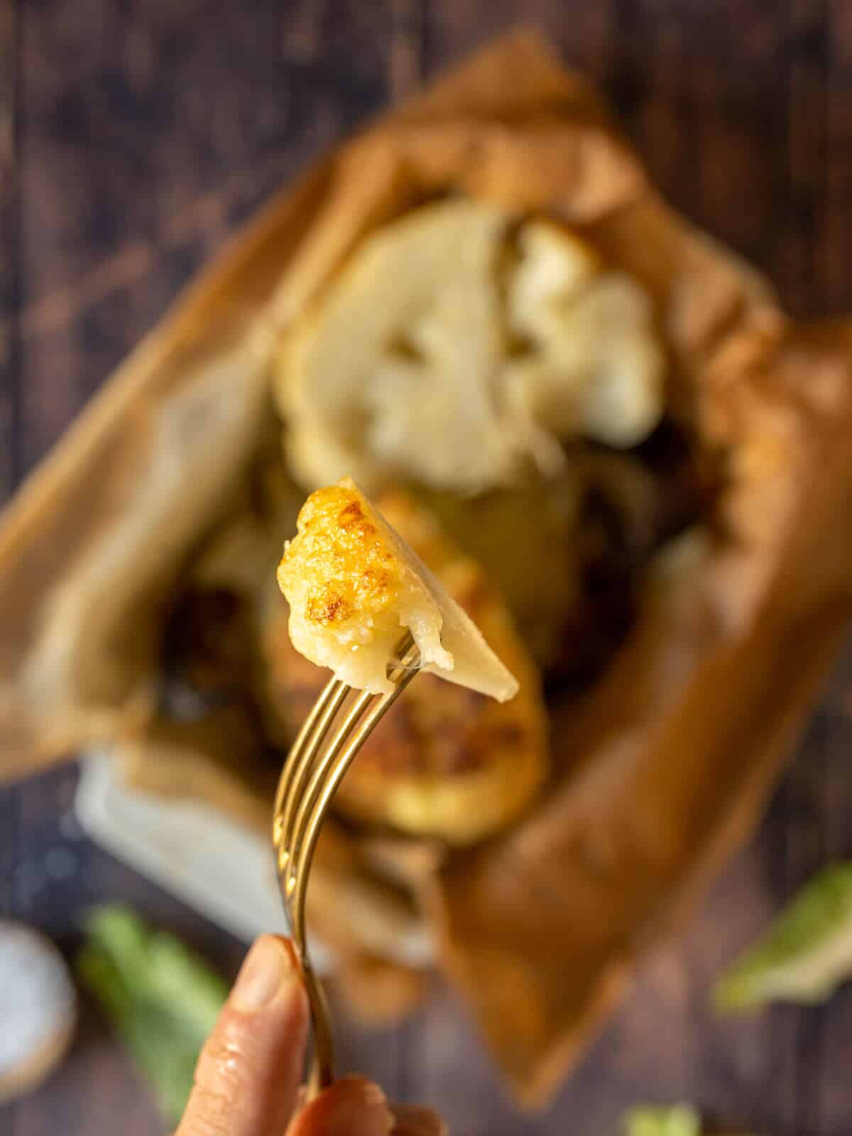 biteof rosted cauliflower in a fork.