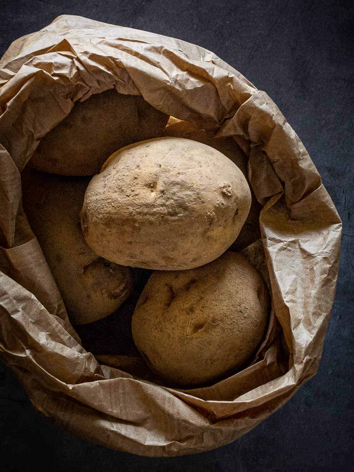 brown bag with potatoes.